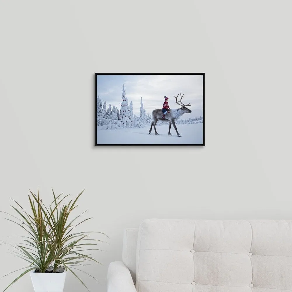 "A girl riding a reindeer through a winter forest" Black Float Frame Canvas Art