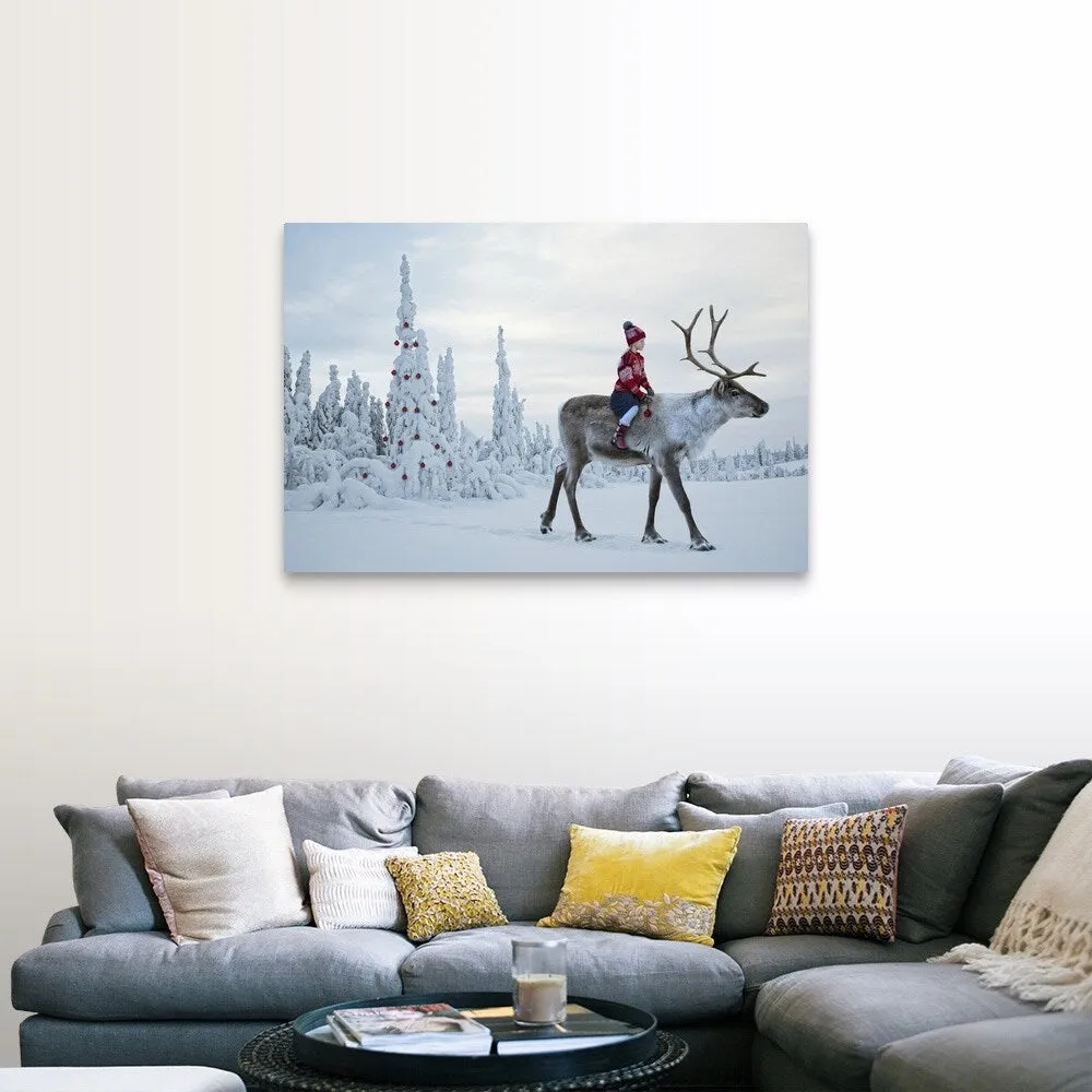 "A girl riding a reindeer through a winter forest" Canvas Wall Art
